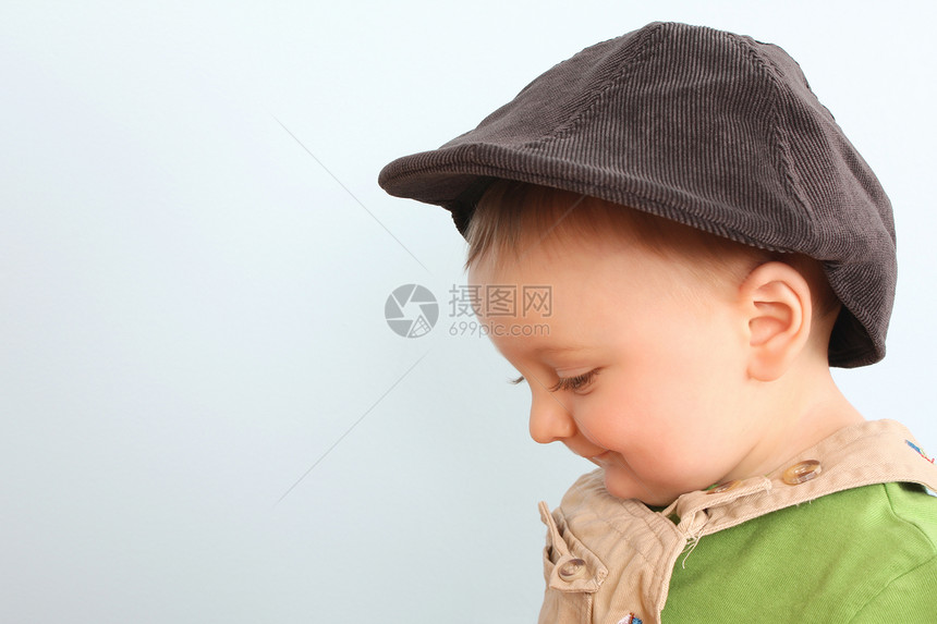 可爱的婴儿工作室绿色眼睛帽子衬衫棕色白色童年男性儿子图片