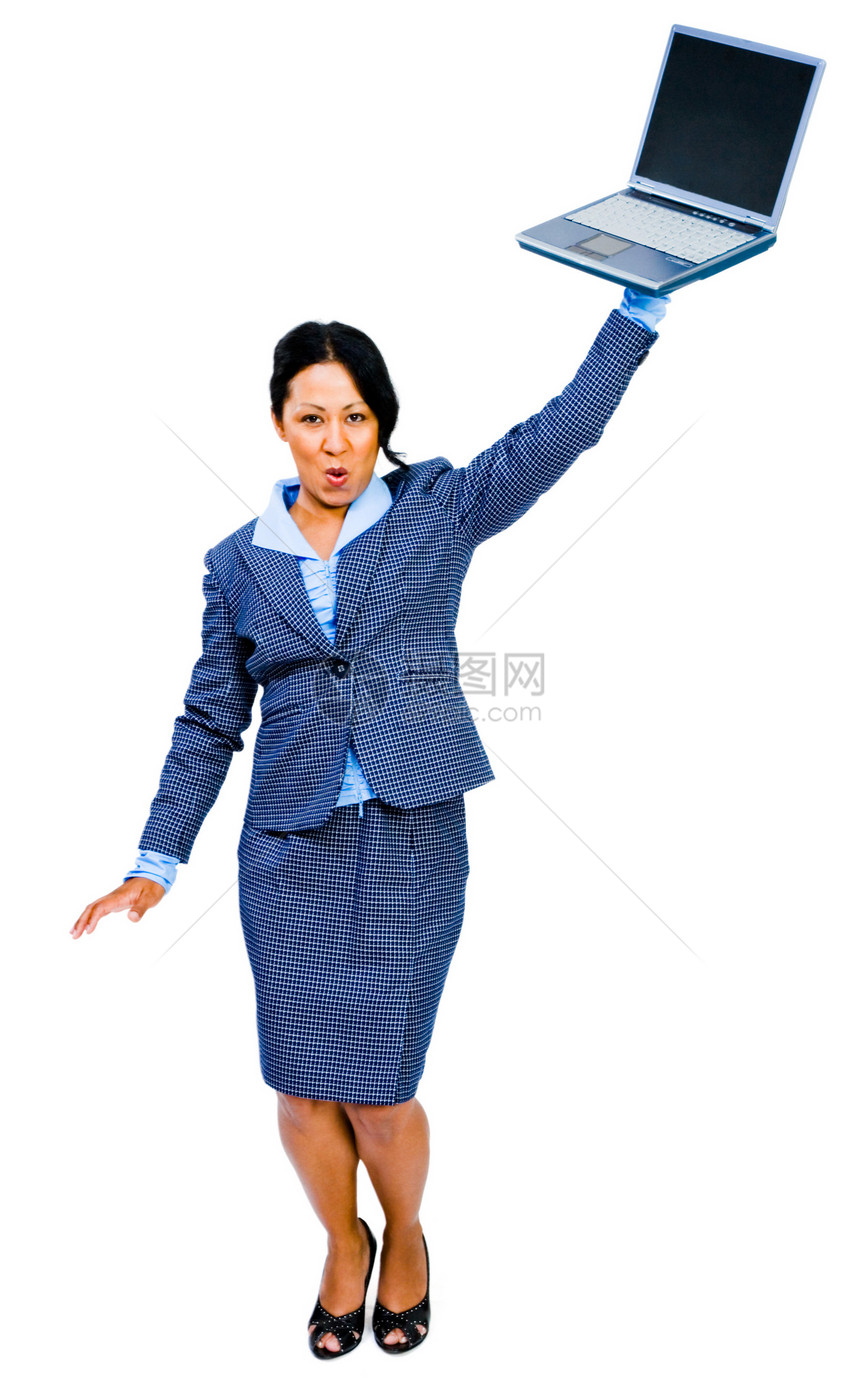 持有膝上型电脑的妇女套装混血衬衫人士商业幸福电讯姿势管理人员机动性图片