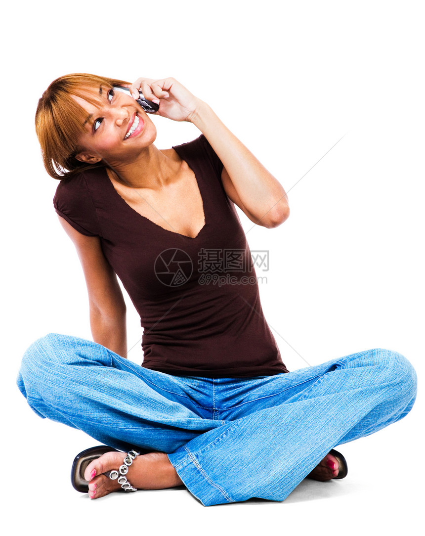 妇女用移动电话说话电讯微笑机动性八卦混血女士拖鞋手机技术白色图片