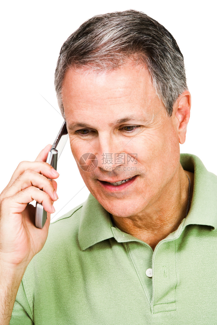 男人在移动电话上说话机动性手机沟通技术衣服翻盖闲暇白色电讯电话图片