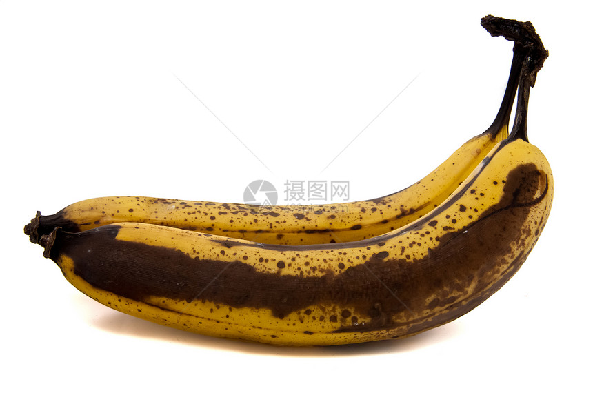 两根旧香蕉水果黑色食物皮肤黄色白色衰变棕色农业早餐图片
