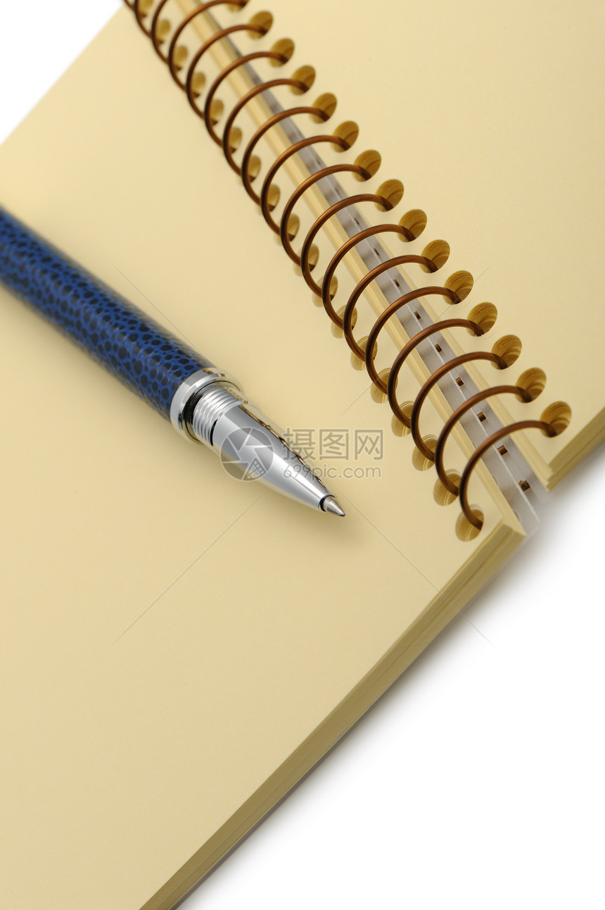 笔和笔记本 在黄纸的螺旋上商业蓝色黄色戒指笔记文档空白办公室墨水白色图片