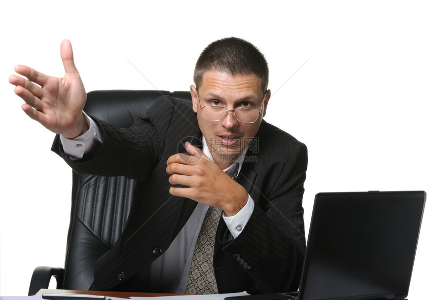 官僚在情感上表现出不满的情绪商务领导扶手椅男性桌子办公室眼镜智力职场经理图片