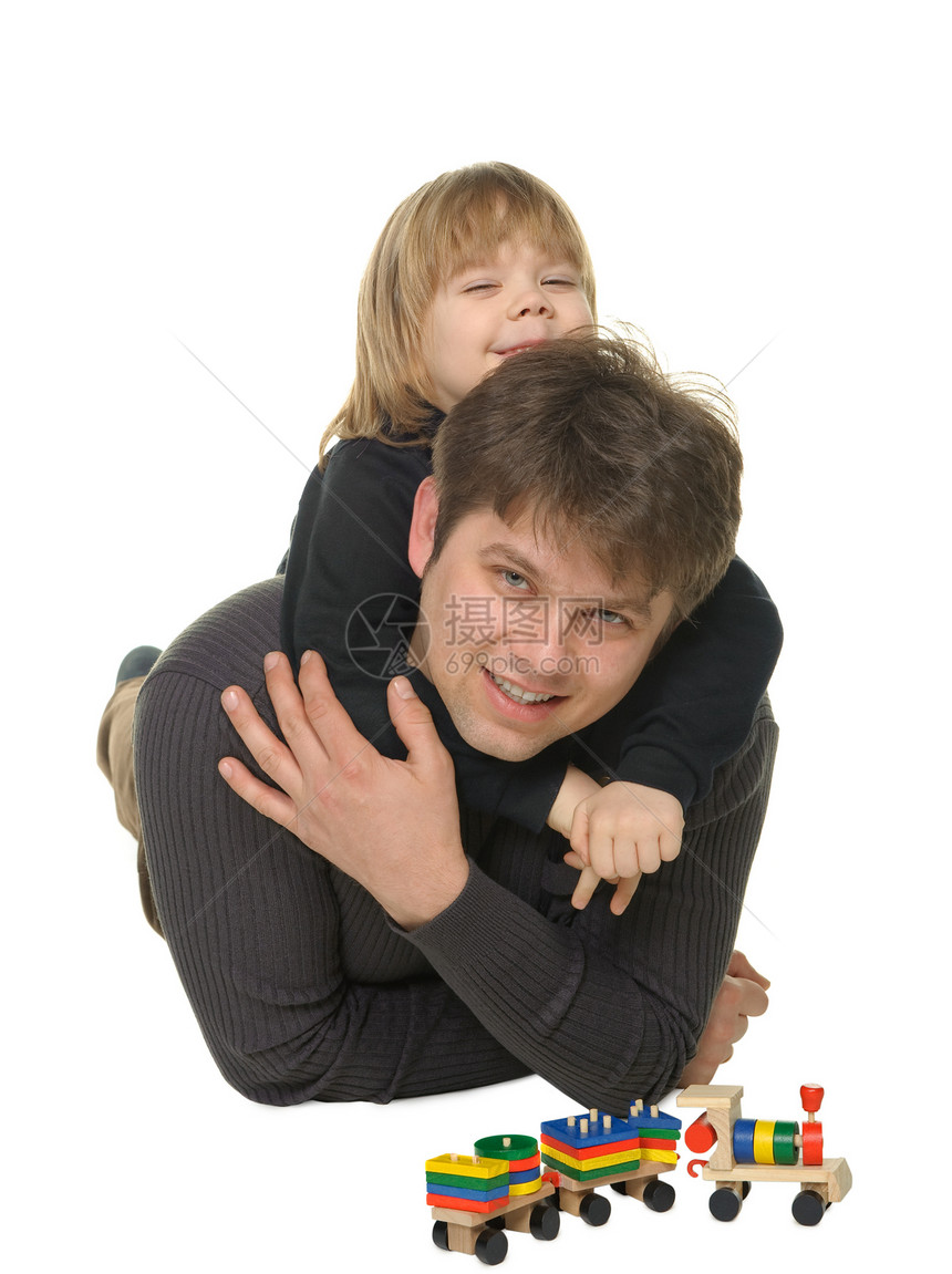 父亲和儿子男生亲热后代拥抱婴儿孩子父母说谎快乐男性图片