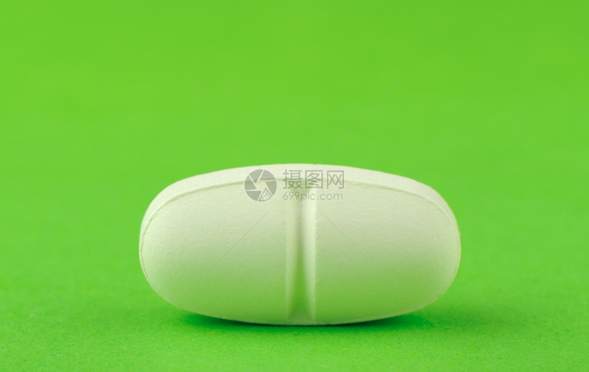 绿色背景的白板科学药店药片阴影胶囊药品化学疾病宏观药理图片