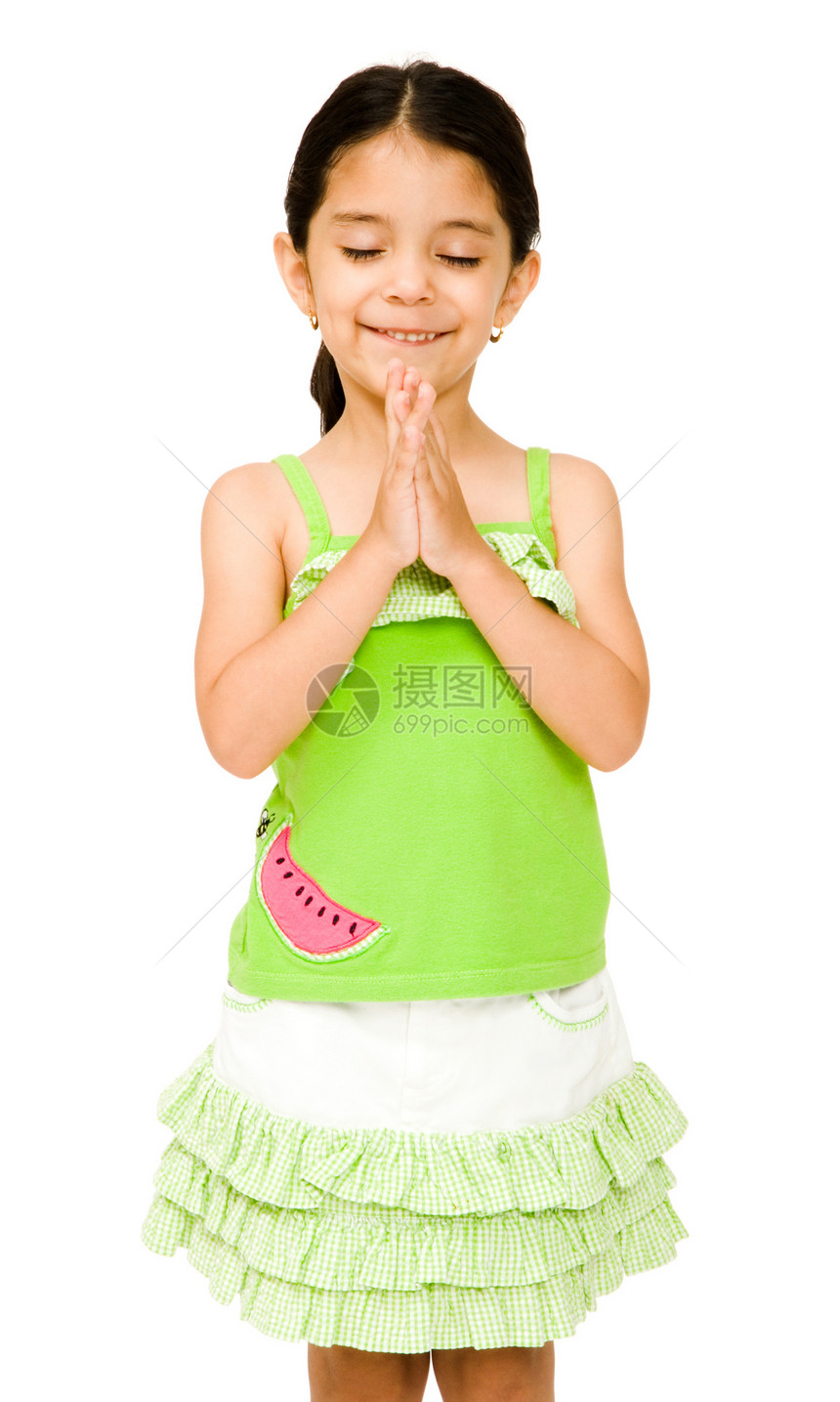 女孩站在祈祷的姿势上图片