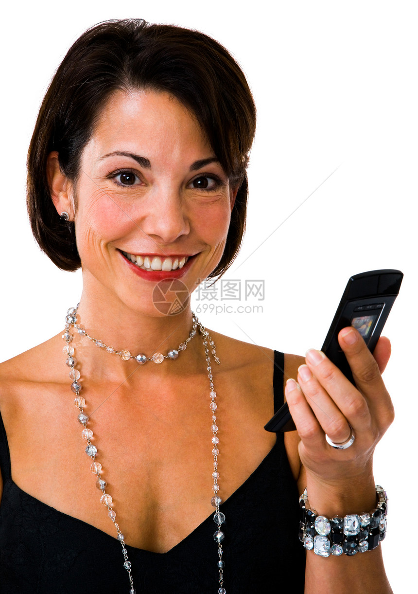 快乐的女子短信乐趣裙子阅读衣服电话项链讯息发送技术机动性图片