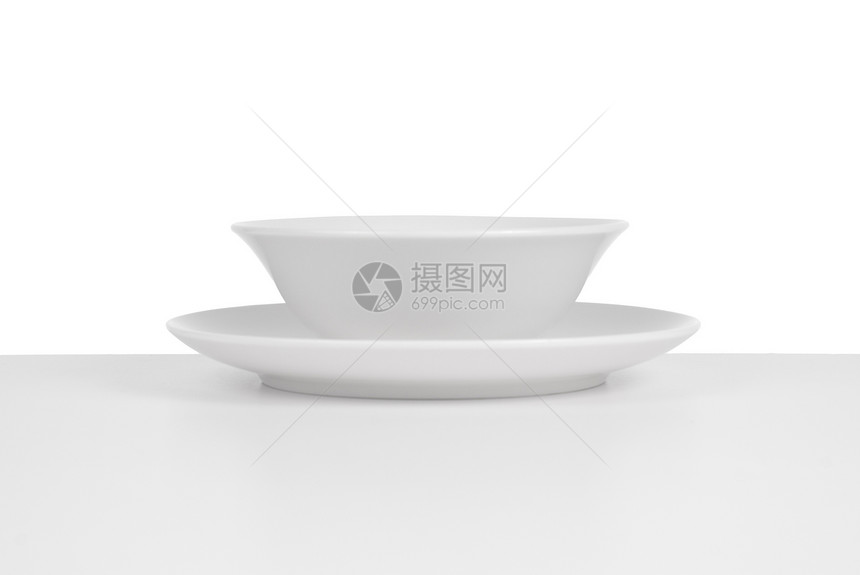 白陶瓷碗和餐盘图片