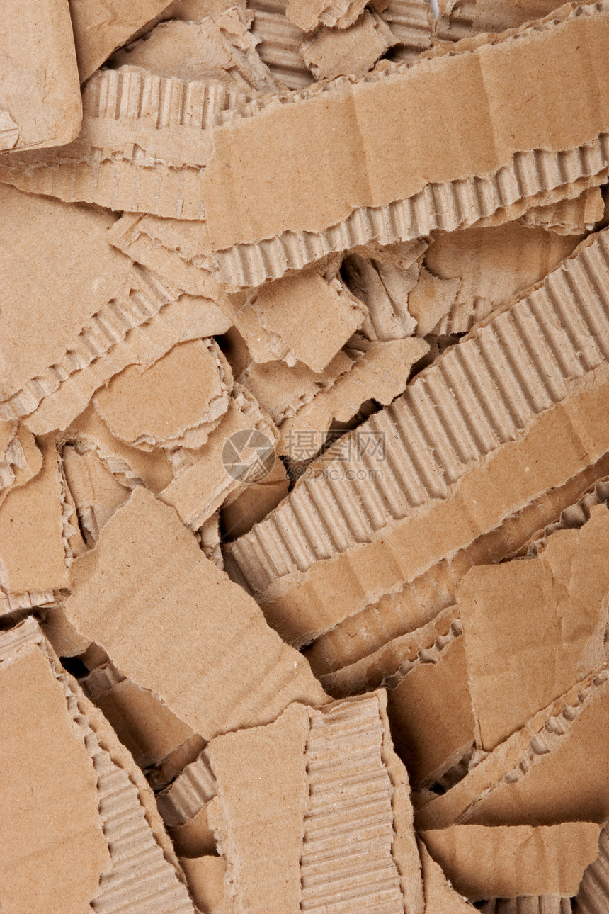 被撕破的纸板堆回收棕色边缘小路包装纸盒材料工业肋骨瓦楞图片