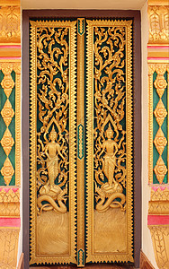 老挝挞阮入口佛教庙门寺庙文化入口精神木头绘画雕刻金子安全宗教背景