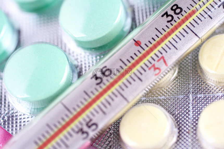 温度计和药丸抗生素疼痛情况危险发烧警告温度紧迫感药店测量图片