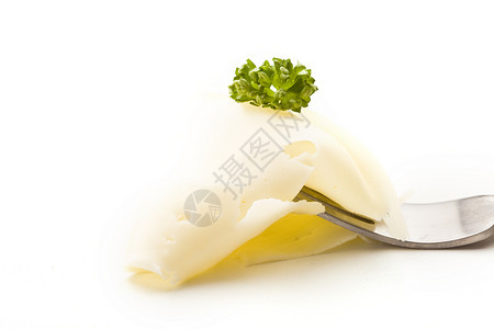 奶酪切片和叉口面的欧斯利产品自制薄片奶制品牛奶背景图片