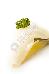 奶酪切片和叉口面的欧斯利自制产品薄片牛奶奶制品背景图片