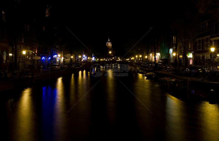 夜间阿姆斯特丹运河运河城市建筑船屋路灯旅游特丹拱桥历史性教会图片