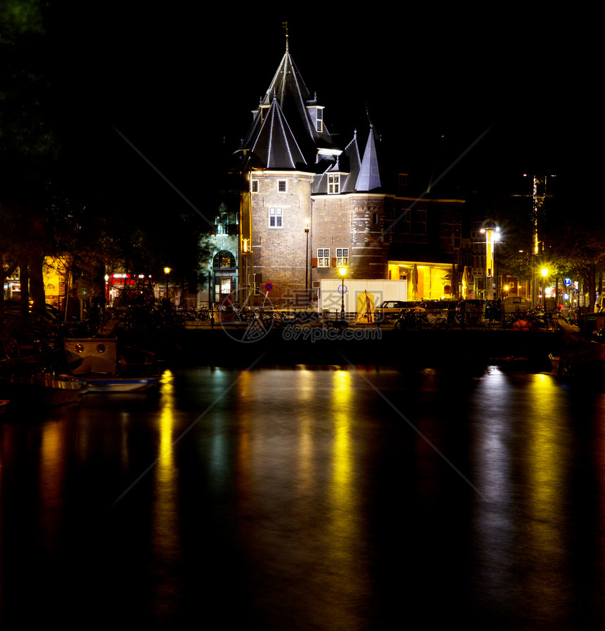 夜间阿姆斯特丹运河旅行旅游运河路灯船屋建筑水平历史性特丹拱桥图片