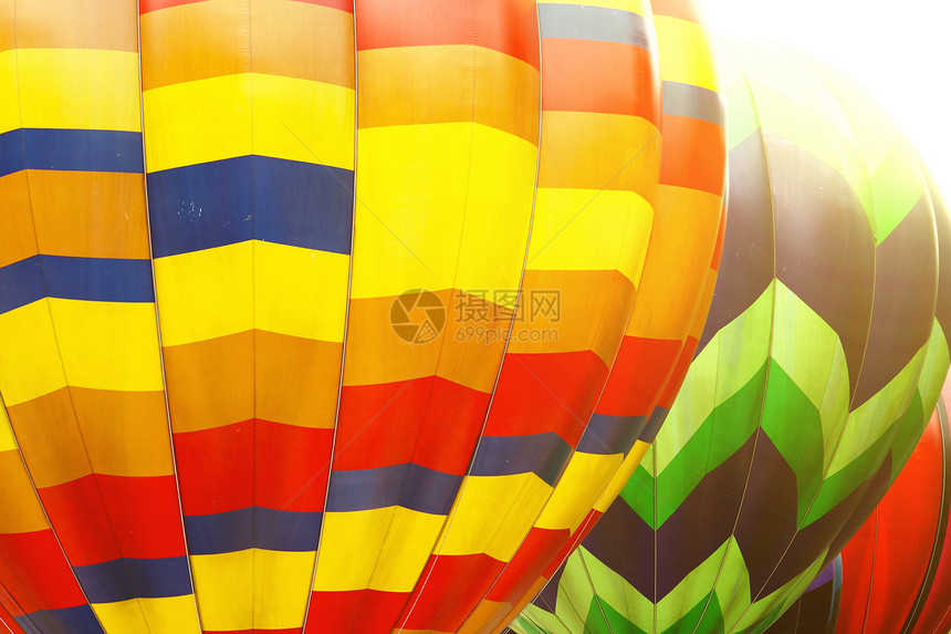 彩色热空气气球和阳光日的照片娱乐节日漂移火焰烧伤篮子太阳飞行员航空自由图片