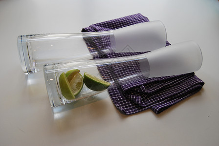 玻璃花瓶食堂毛巾绿色方格紫色餐厅石灰片瓶子厨房背景图片