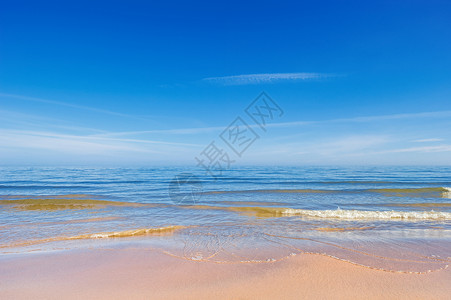 海洋和天空海岸线海浪阳光反射热带流动海片波纹海景海岸背景图片