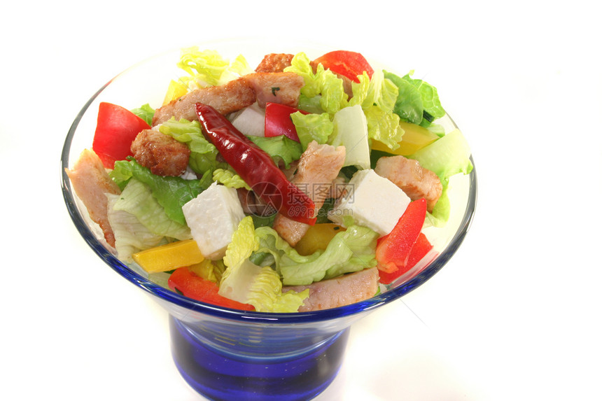 混合沙拉和火鸡条蔬菜盘子绿色油炸食物草药沙拉酱维生素黄色红色图片