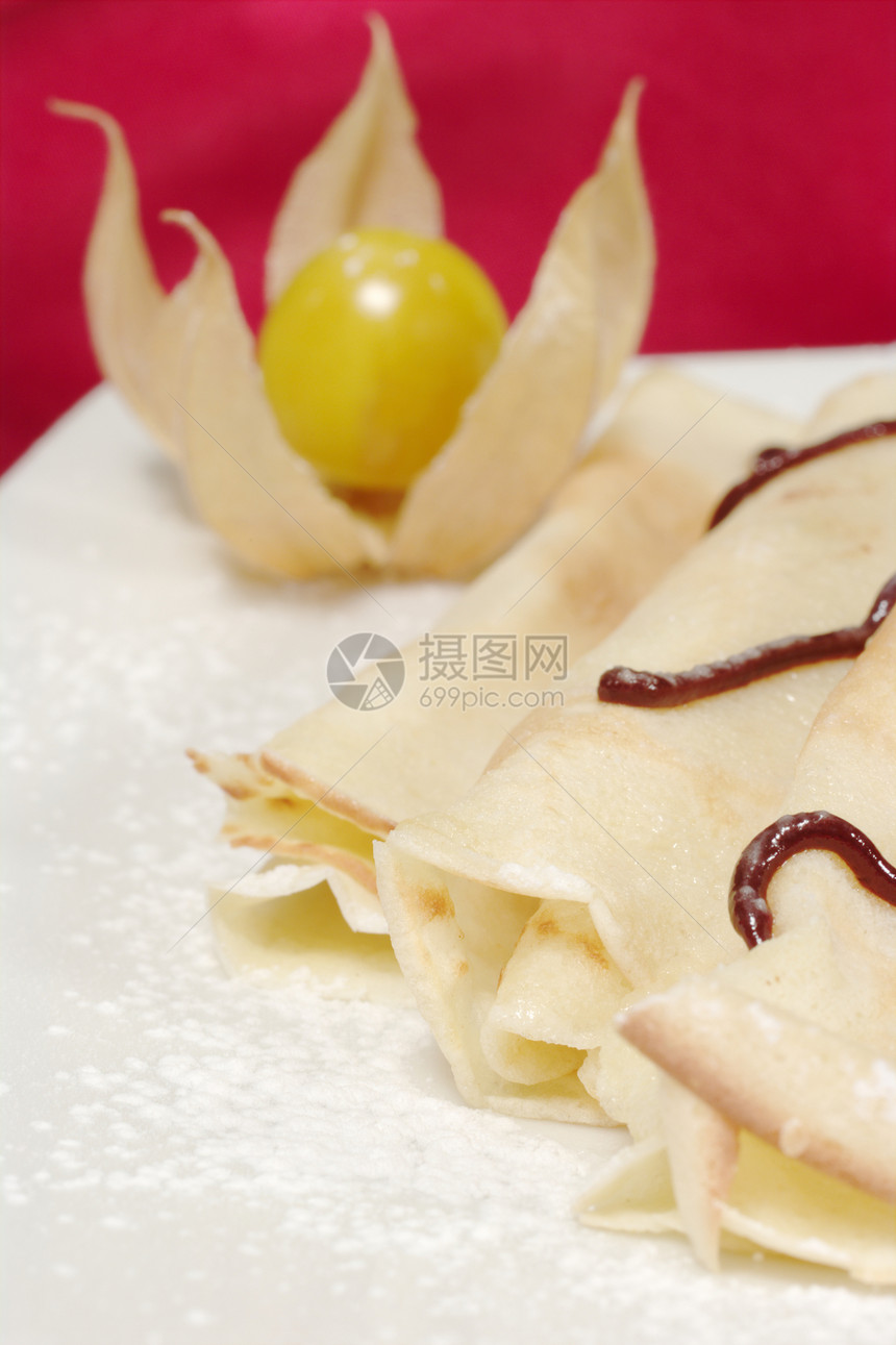 煎饼食物粉末巧克力饼子白色纺织品红色橙子酸浆水果图片