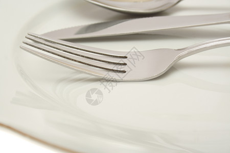 迎合带刀叉的空板餐具早餐盘子接待餐厅用具刀具美食环境自助餐背景