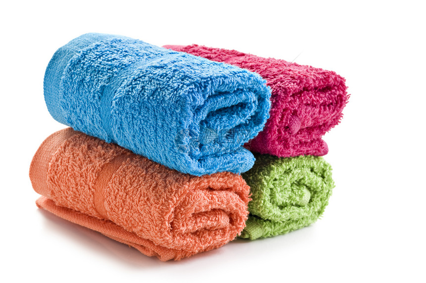 白色背景的新鲜毛巾卷起家居蓝色夫妻淋浴棉布卫生织物温泉用品治疗图片