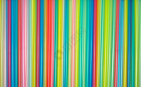 稻草粉色条纹黄色红色蓝色绿色白色塑料背景图片