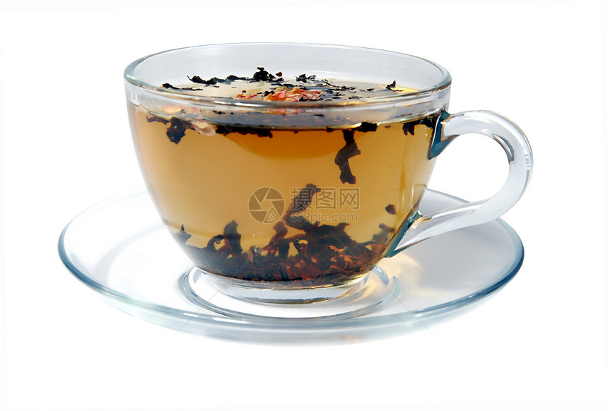 在一个透明的杯子里茶茶食物玻璃阴影花瓣金子咖啡店活力早餐茶点飞碟图片
