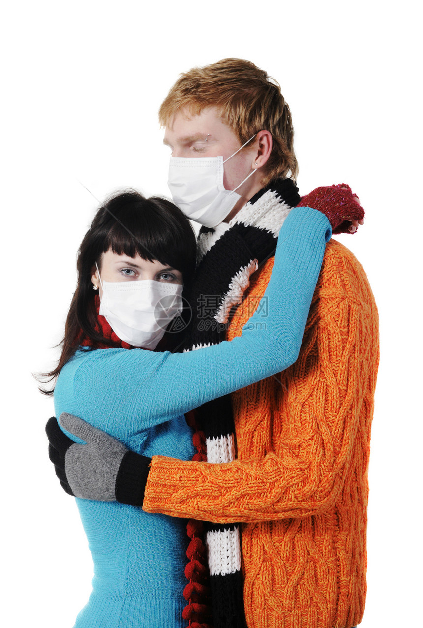 男人拥抱戴面罩 带流感的妇女女性手帕团体疼痛男性药品传染性发烧女孩鼻子图片