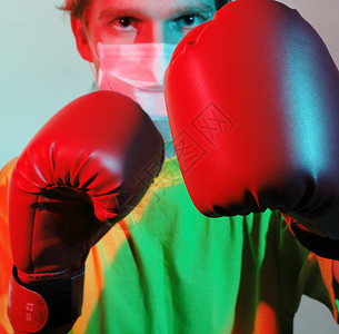 红拳击手套防流感医生防治流感工作室临床斗争男人专家拳击手力量盒子学生工作背景图片