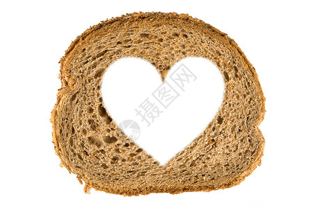 心形面包面包片中的心形洞生活棕褐色脆皮饮食营养购物粮食早餐美食化合物背景