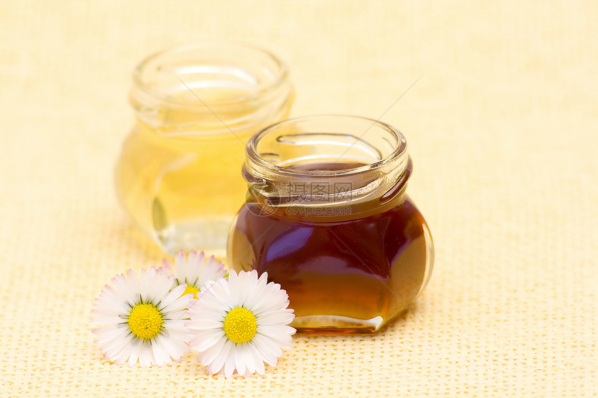 蜜蜂和椰枣芳香粉色产品流感液体雏菊食物营养玻璃甜点图片