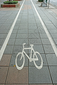 自行车车道符号信号交通小路路标运输旅行树木驾驶安全人行道背景图片