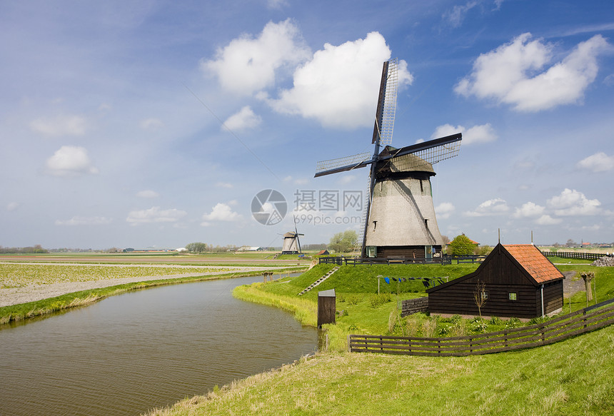 荷兰阿尔克马尔附近的风车外观位置运河世界旅行建筑学图片