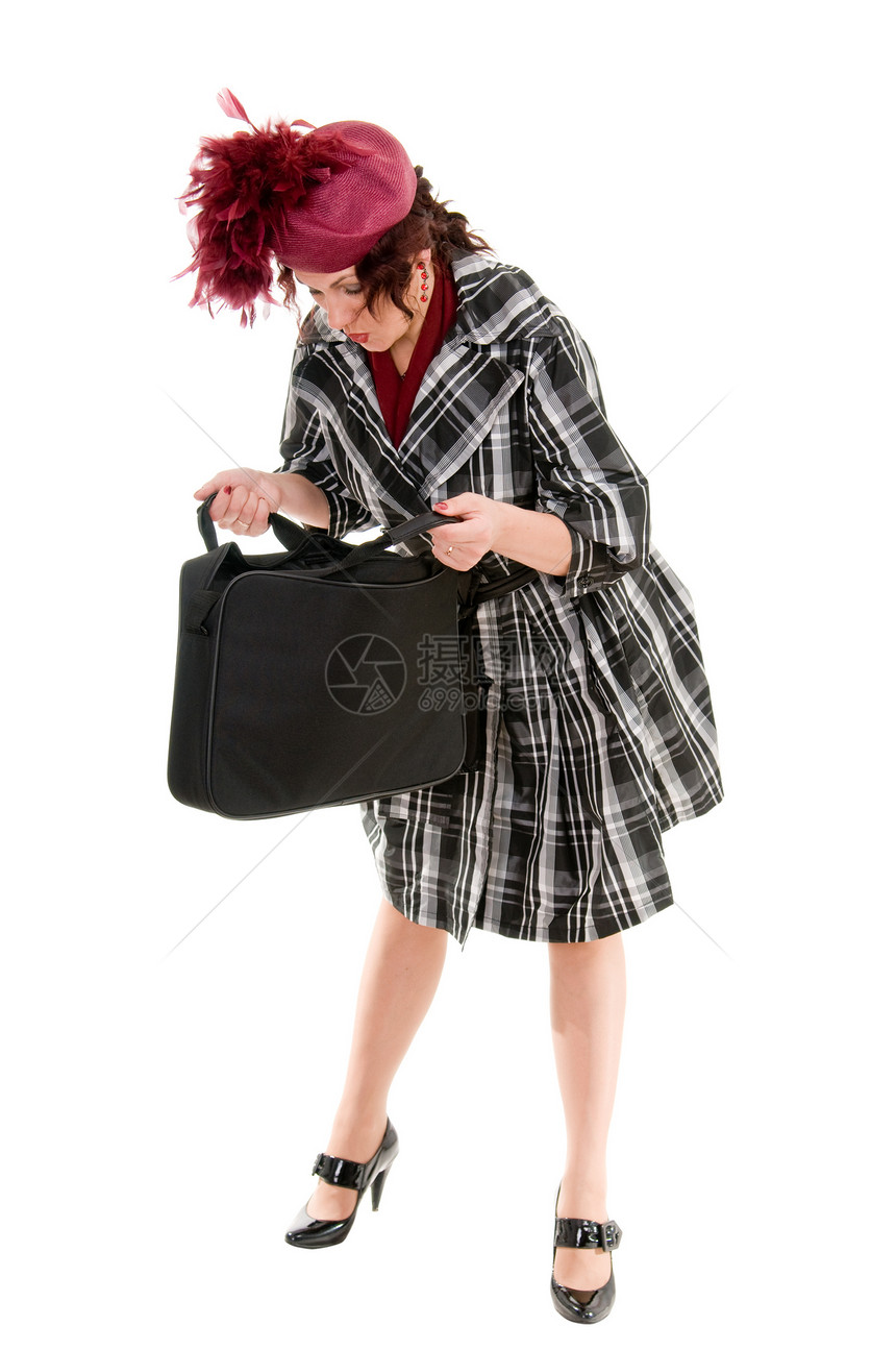 带包袋的妇女衣服披风黑发情感手提包惊喜贝雷帽帽子引擎盖旅行图片