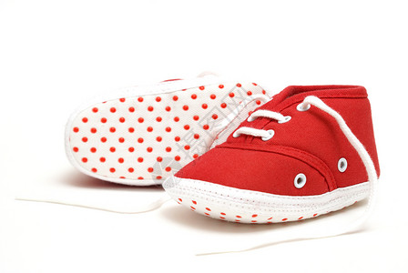 婴儿鞋鞋带靴子儿童婴儿鞋类孩子们白色青年红色赃物背景图片