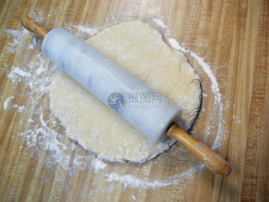 翻滚数烘烤木板面团大理石烹饪面粉食品面包图片