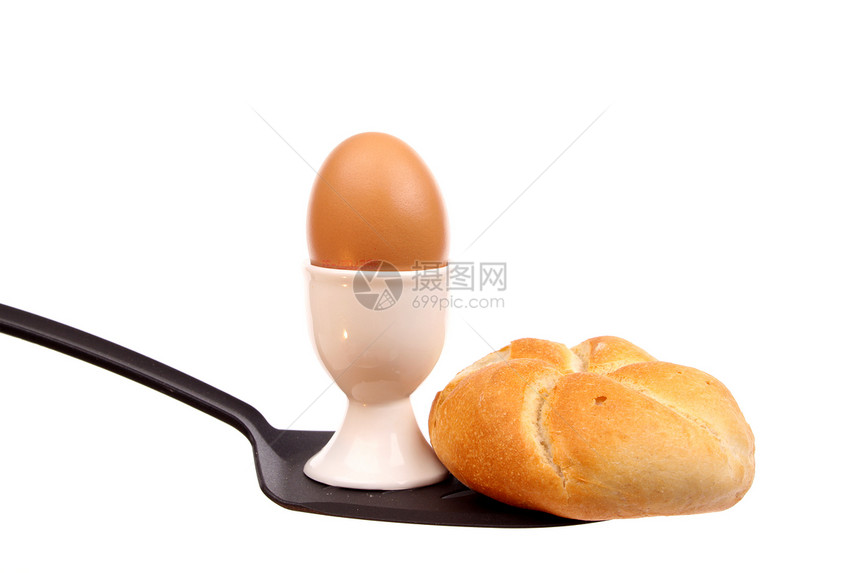 鸡蛋和勺子上的面包工作室种子面粉食物烘烤面团包子产品玉米午餐图片