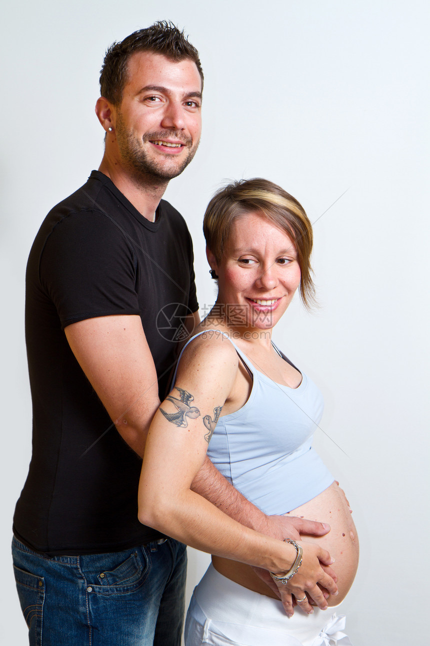 怀孕幸福男人母性孩子丈夫成人腹部女士妻子微笑图片