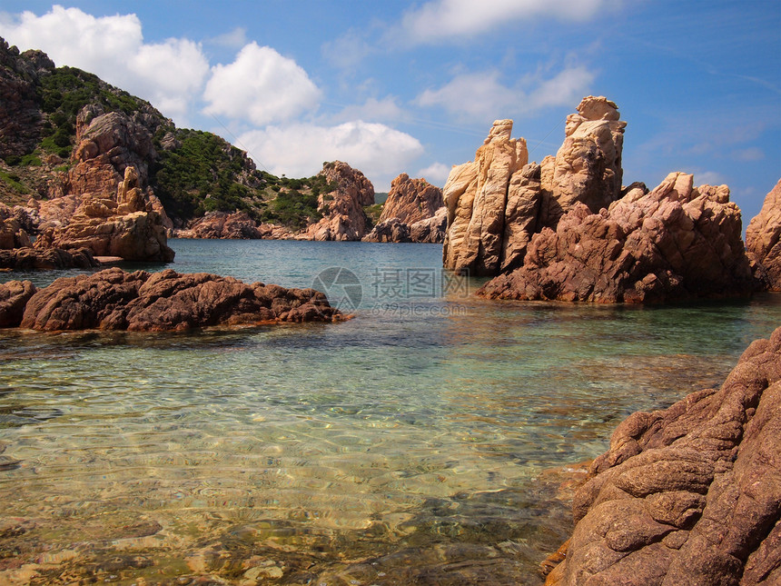 撒丁海岸天堂风景海滩岩石红色崎岖图片