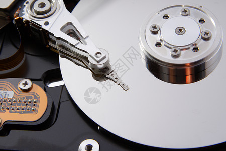 光盘电脑素材混杂硬盘光盘硬件金属软件宏观桌面机密电子产品安全反射硬盘背景