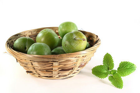 小黄李子米拉贝维生素李子绿色装罐收成食物市场生态水果背景