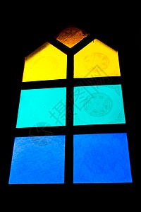 彩色玻璃窗户辉光黄色窗格艺术玻璃状蓝色背景图片