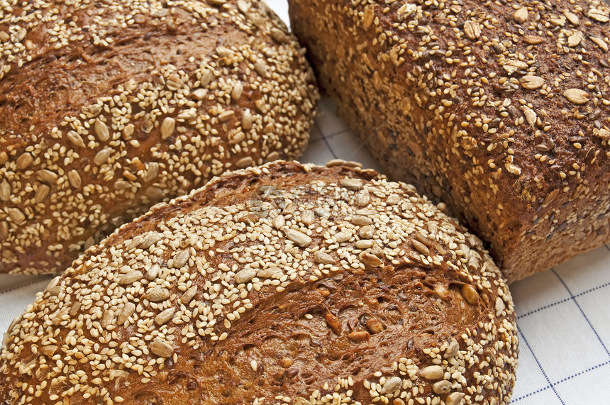 整个谷物面包健康饮食纤维玉米食物种子棕色小吃粮食晚餐图片