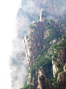 黄山山黄色薄雾风景旅游山脉顶峰旅行山峰背景图片