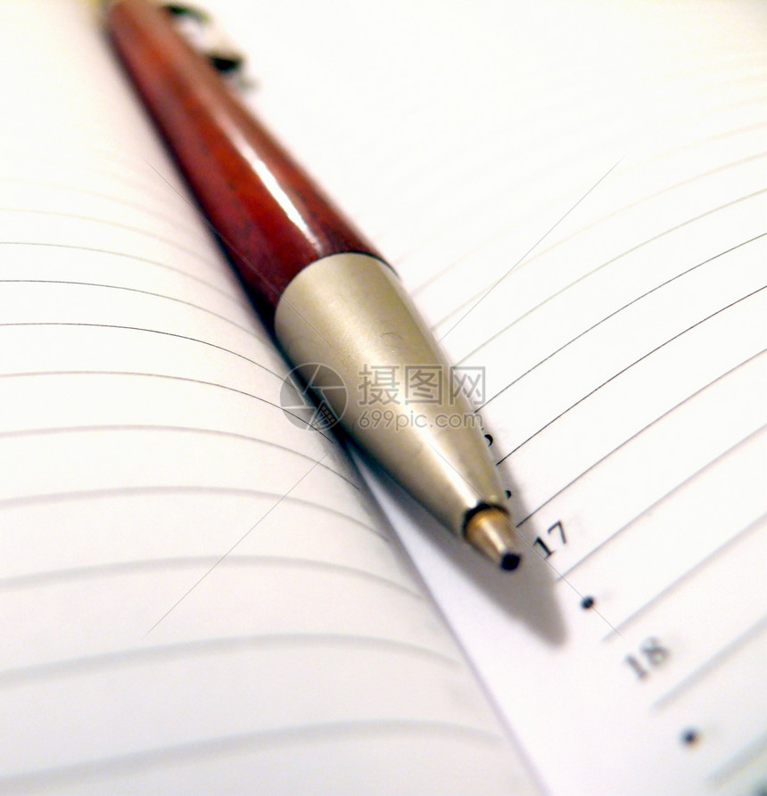 用笔打开笔记本白色墨水空白商业床单宏观办公室线条日记杂志图片