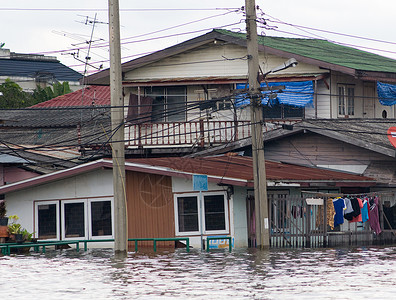 泰国曼谷的洪水淹水房屋社区房子气候季风灾难环境季节城市热带建筑背景