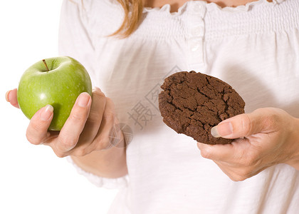 苹果和饼干营养减肥巧克力体重水果饮食绿色背景图片