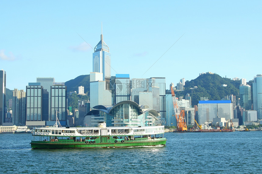 香港港港和星渡轮摩天大楼天际血管航行建筑历史性星星蓝色天空城市图片