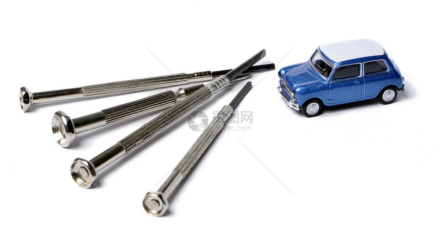 白色上隔离的小型汽车和螺旋车机械车辆金属工作工具服务玩具宏观维修图片